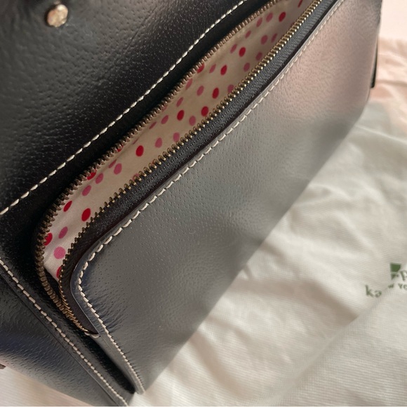 Kate Spade Satchel Black leather. Outside zipper. Top zipper.